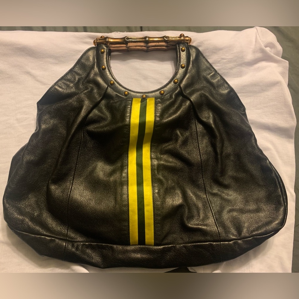 Gucci purse with bamboo styled handles